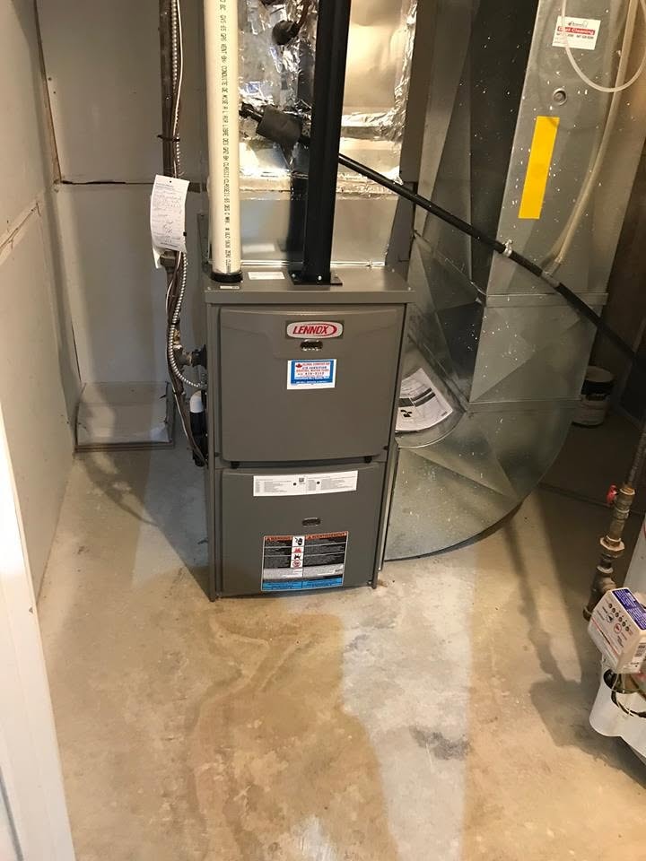 Completed Lennox furnace installation in a residential mechanical room
